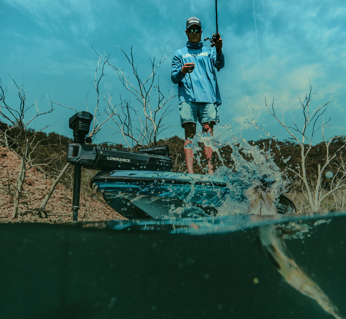 A man fishing on the water.